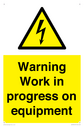 warning-work-in-progress-on-equipmentwith-electrical-hazard-symbol~